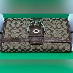 Vintage Coach Signature SoHo trifold wallet w/check book cover included.